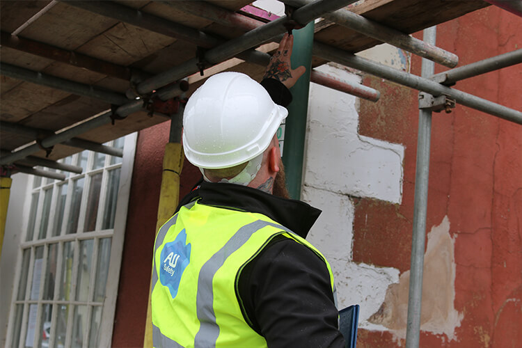 Martin Watson inspecting scaffolding